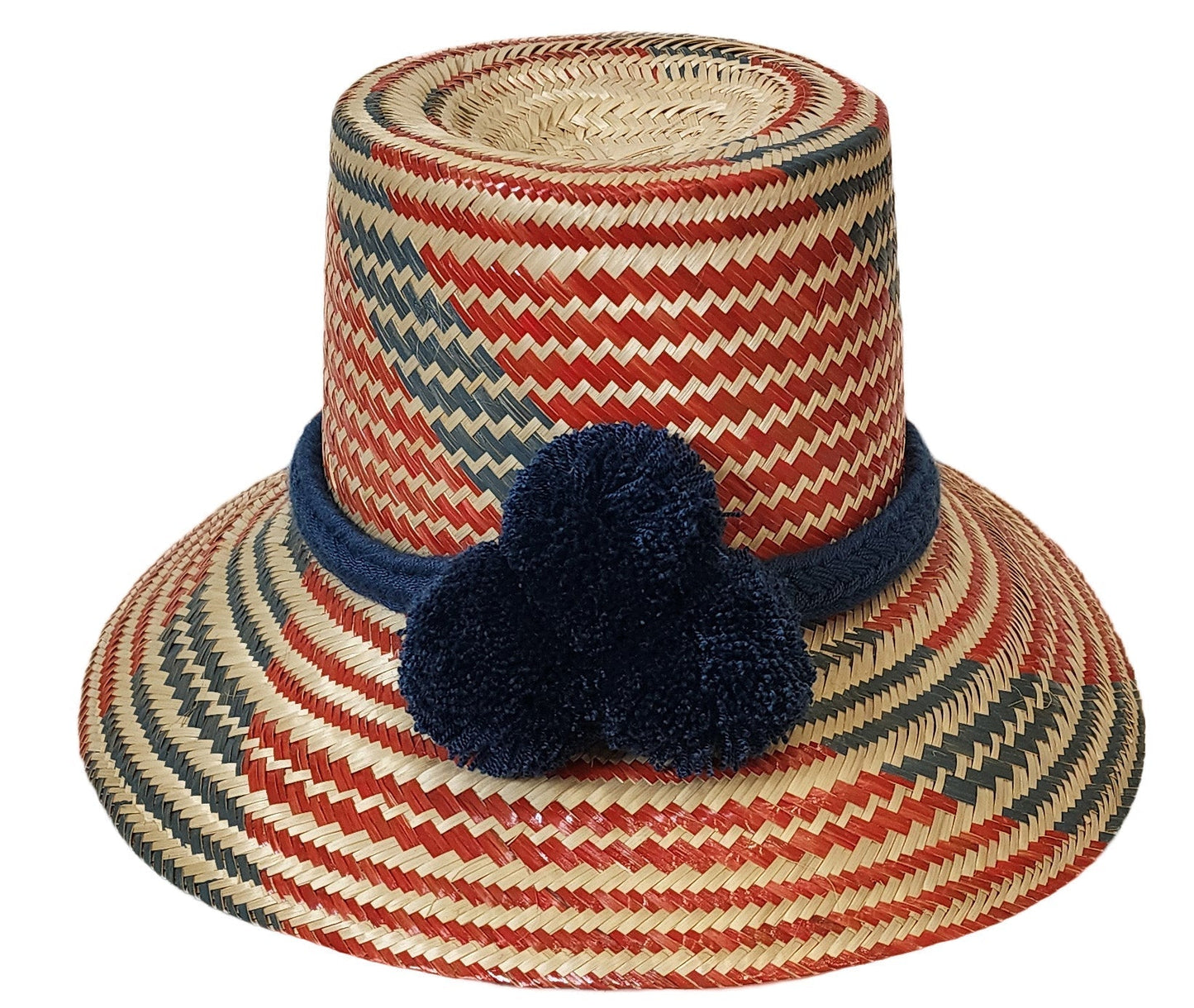 "Colorful, handmade artisan straw hat by Wuitusu, crafted by the Wayuu tribe using dyed Iraca palm fiber."