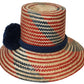 "Colorful, handmade artisan straw hat by Wuitusu, crafted by the Wayuu tribe using dyed Iraca palm fiber."