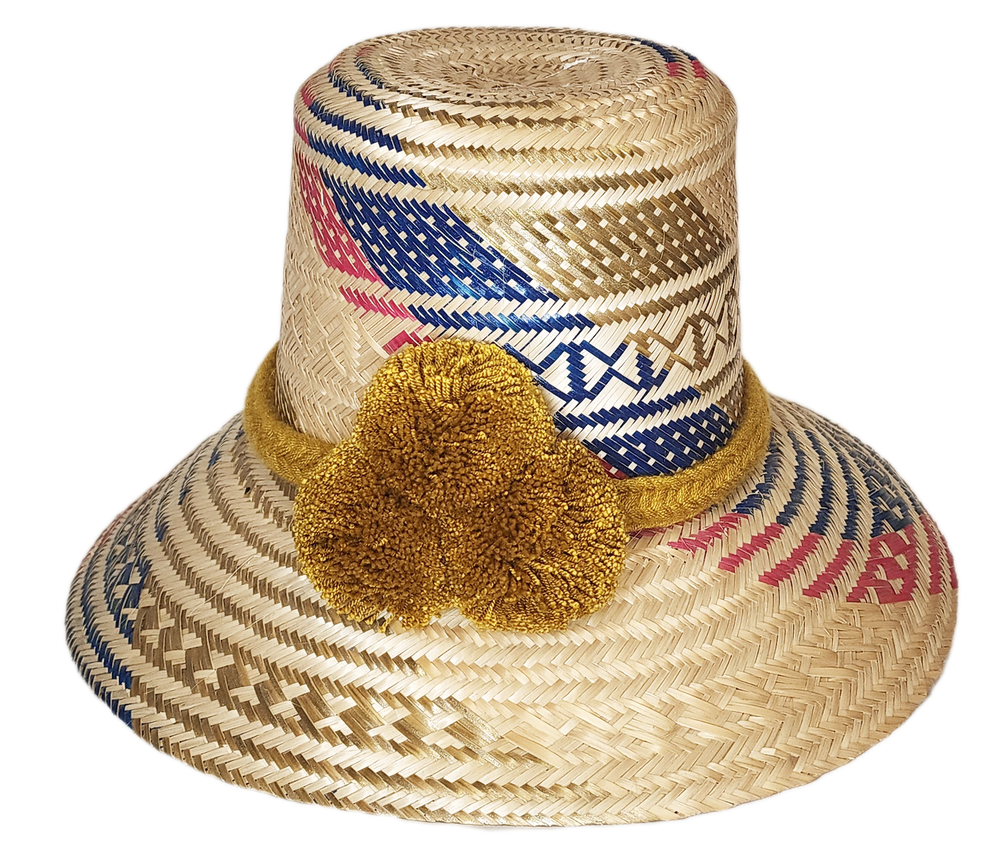 "Colorful handmade Artisan Wayuu Hat from Iraca palm, adorned with significant cultural pompoms, crafted by Wayuu artisans."