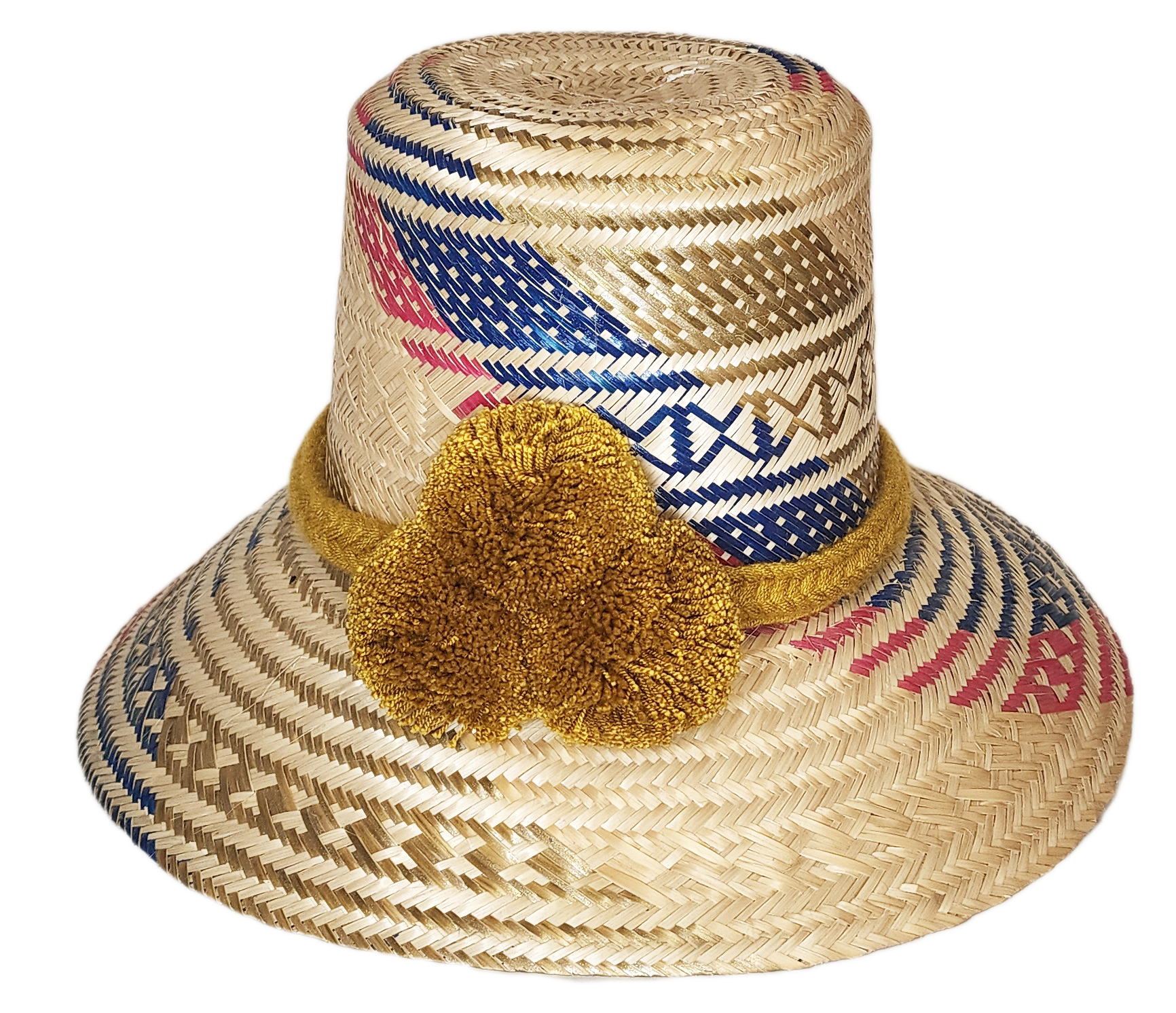 "Colorful handmade Artisan Wayuu Hat from Iraca palm, adorned with significant cultural pompoms, crafted by Wayuu artisans."