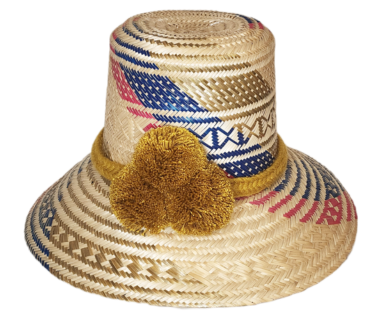 "Colorful handmade Artisan Wayuu Hat from Iraca palm, adorned with significant cultural pompoms, crafted by Wayuu artisans."