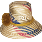 "Colorful handmade Artisan Wayuu Hat from Iraca palm, adorned with significant cultural pompoms, crafted by Wayuu artisans."