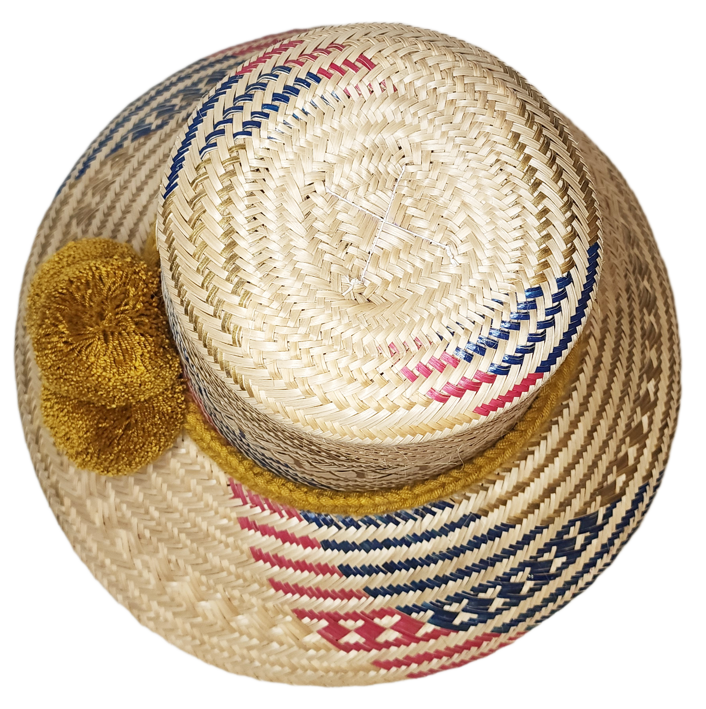 "Colorful handmade Artisan Wayuu Hat from Iraca palm, adorned with significant cultural pompoms, crafted by Wayuu artisans."