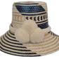 Handmade Boho Wayuu straw hat with bold pink and purple pompoms and artisan weaving