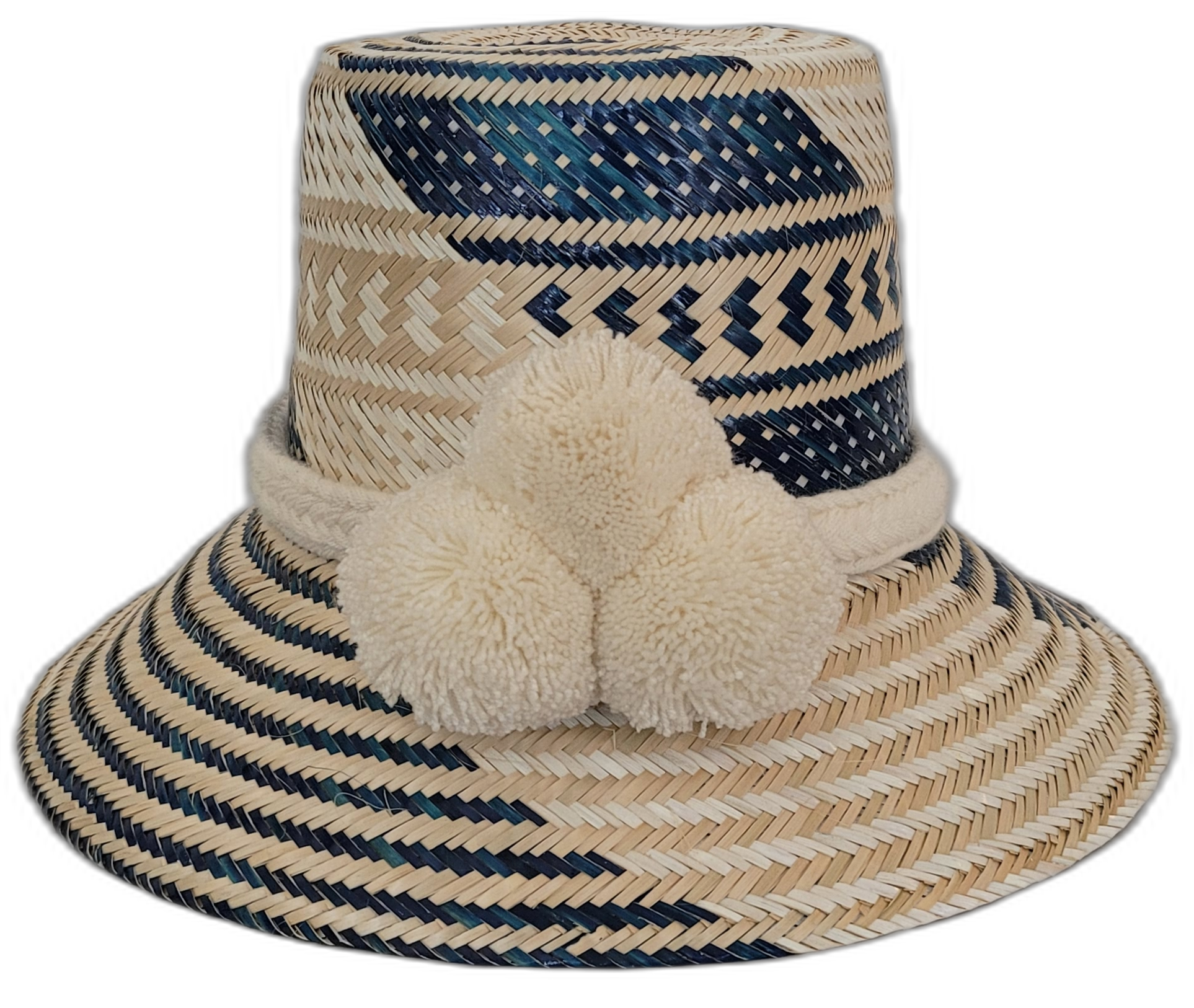 Handmade Boho Wayuu straw hat with bold pink and purple pompoms and artisan weaving