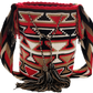 Vibrant Wayuu bag with artisan-woven strap and tribal chevron design. Red and earth tones make this boho crossbody a standout accessory