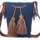 "Colorful handmade crochet bags by Wayuu women, featuring vibrant patterns and long straps, crafted from vegan fibers."