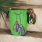 "Colorful handmade crochet bags by Wayuu women of Colombia, featuring vibrant, culturally symbolic designs."