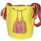 "Colorful handmade crochet bags by Wayuu women, showcasing vibrant bohemian patterns and artisanal craftsmanship."