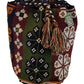 "Colorful handmade crochet crossbody bag by Wayuu women, showcasing vibrant patterns and hues, symbolizing cultural heritage.