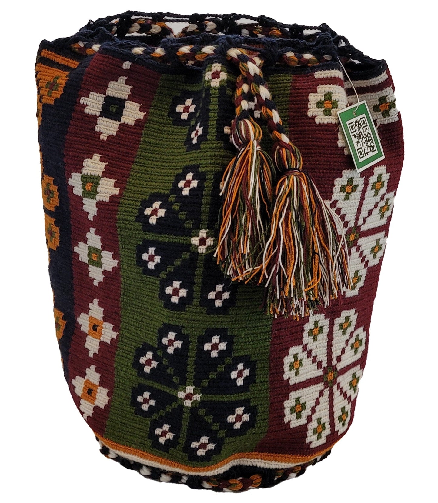 "Colorful handmade crochet crossbody bag by Wayuu women, showcasing vibrant patterns and hues, symbolizing cultural heritage.