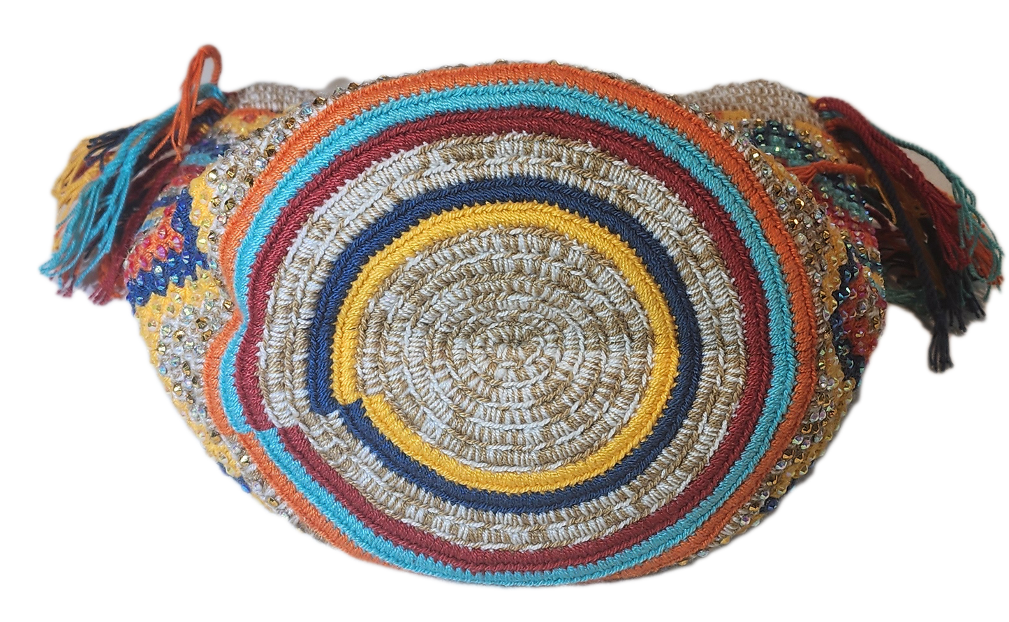 "Colorful handmade crochet crossbody bag by Wuitusu, showcasing intricate Wayuu patterns, with a flexible, long strap."