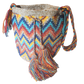 "Colorful handmade crochet crossbody bag by Wuitusu, showcasing intricate Wayuu patterns, with a flexible, long strap."
