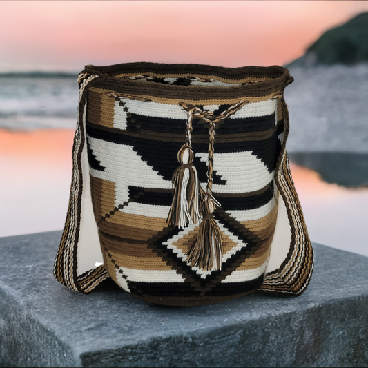 "Colorful handmade Crochet Wayuu Bag by Wuitusu, showcasing vibrant, unique patterns and a boho style, perfect for any occasi