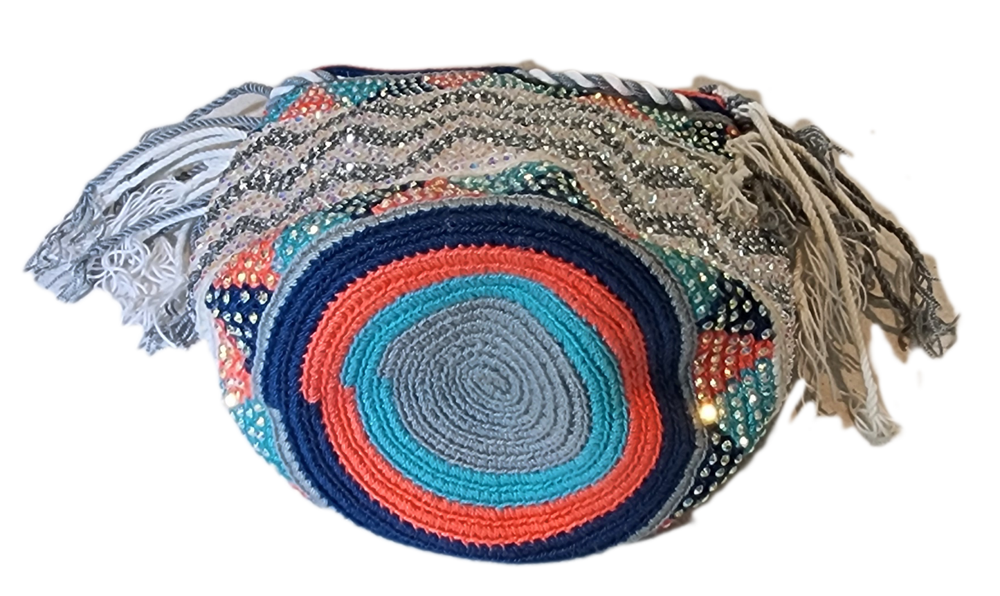 "Colorful handmade crochet Wayuu bag featuring intricate geometric patterns and a long strap, showcasing bohemian artistry an