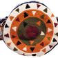 "Colorful handmade Crochet Wayuu bag with geometric designs, crafted by Wayuu artisans, perfect for versatile use."