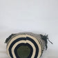 "Colorful handmade Crochet Wayuu bag with geometric motifs, crafted by indigenous artisans, perfect for versatile use."