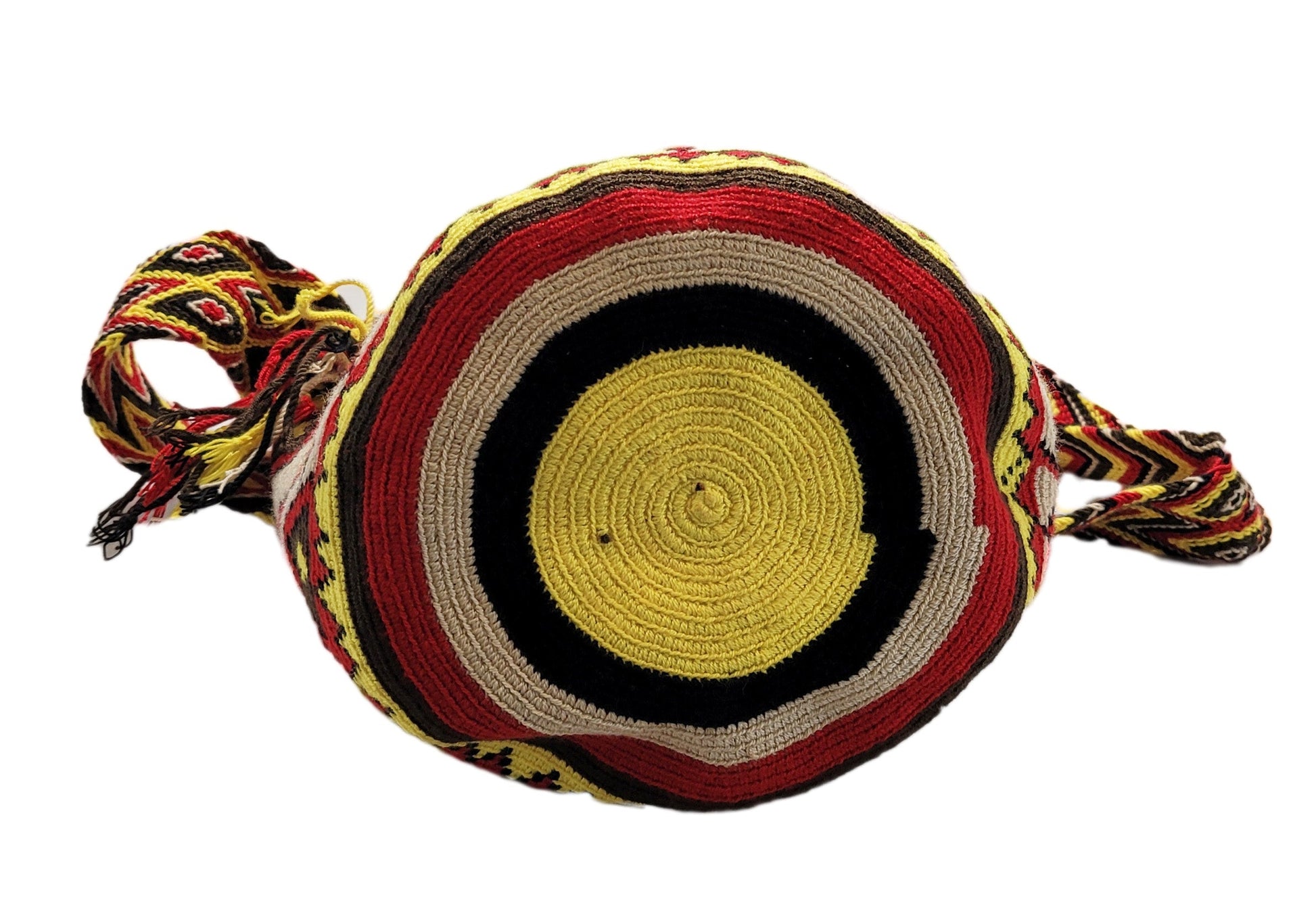 "Colorful handmade crochet Wayuu bag with intricate geometric patterns, showcasing traditional artisan craftsmanship."