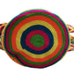 "Colorful handmade Crochet Wayuu Bag with unique patterns, showcasing bohemian artistry and adjustable straps."