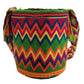 "Colorful handmade Crochet Wayuu Bag with unique patterns, showcasing bohemian artistry and adjustable straps."