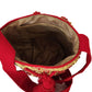 "Colorful handmade Medium Wayuu crochet bag by Wuitusu artisans, featuring vibrant designs and comfortable straps."