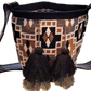 "Colorful handmade Paleteada Crochet Wayuu Bag by Wuitusu, showcasing unique geometric patterns and adjustable strap."