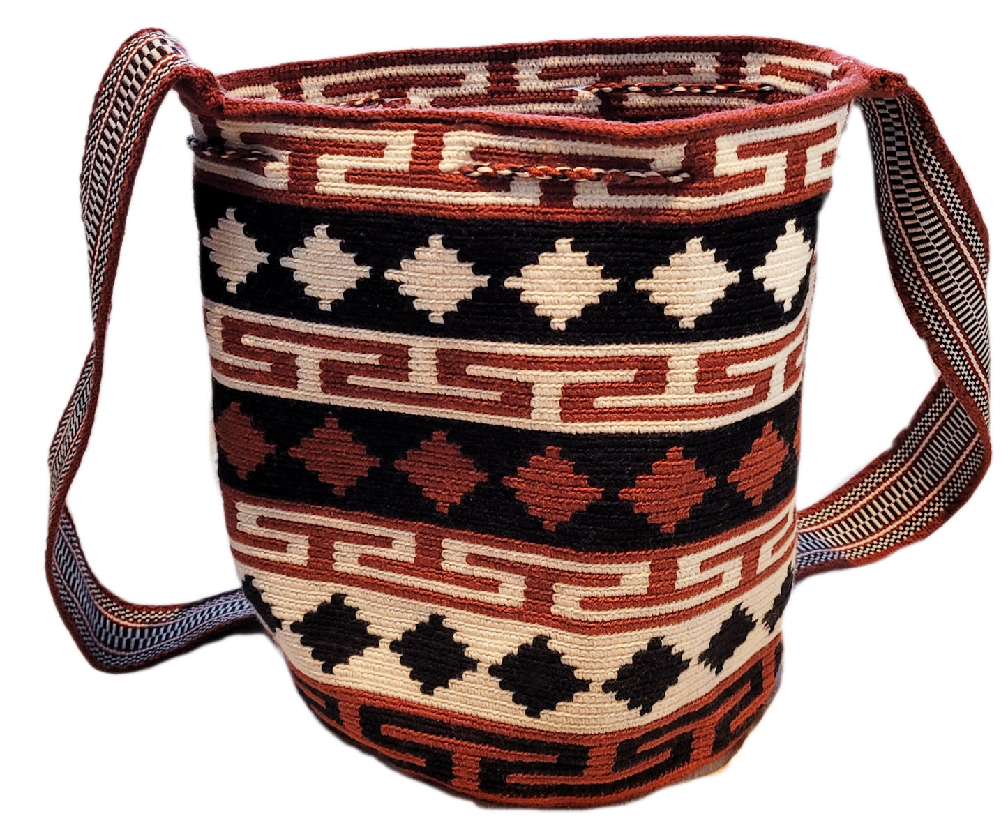 "Colorful handmade Paleteada Wayuu crochet bag with adjustable straps, showcasing traditional geometric patterns and supporti