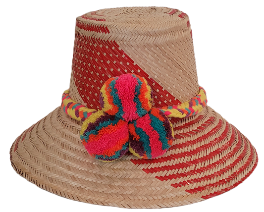 Colorful handmade straw hat with rainbow pompoms and red woven pattern