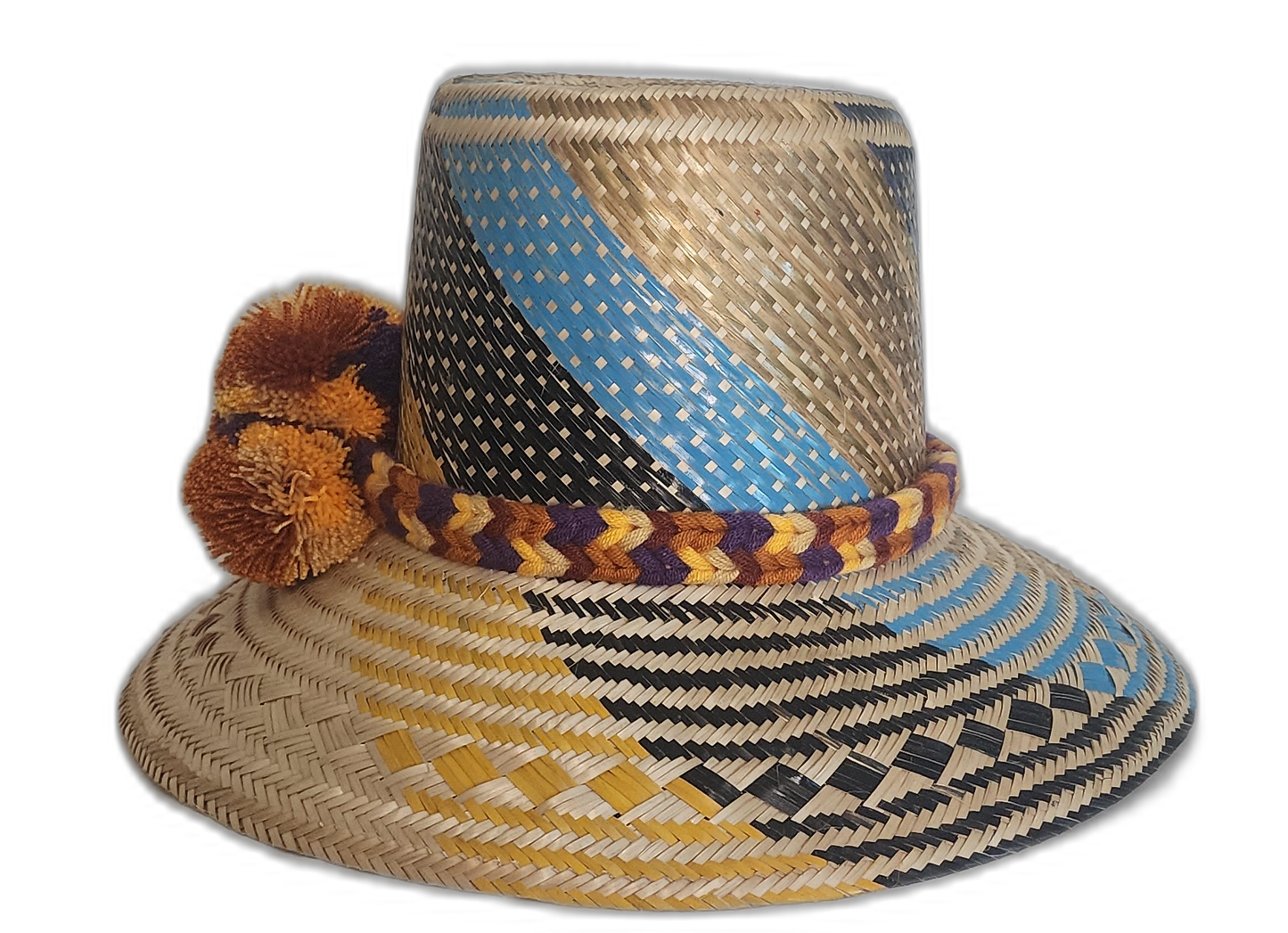 Boho chick straw hat crafted by Wayuu hands, showcasing intricate geometric weaving and bold color contrasts.