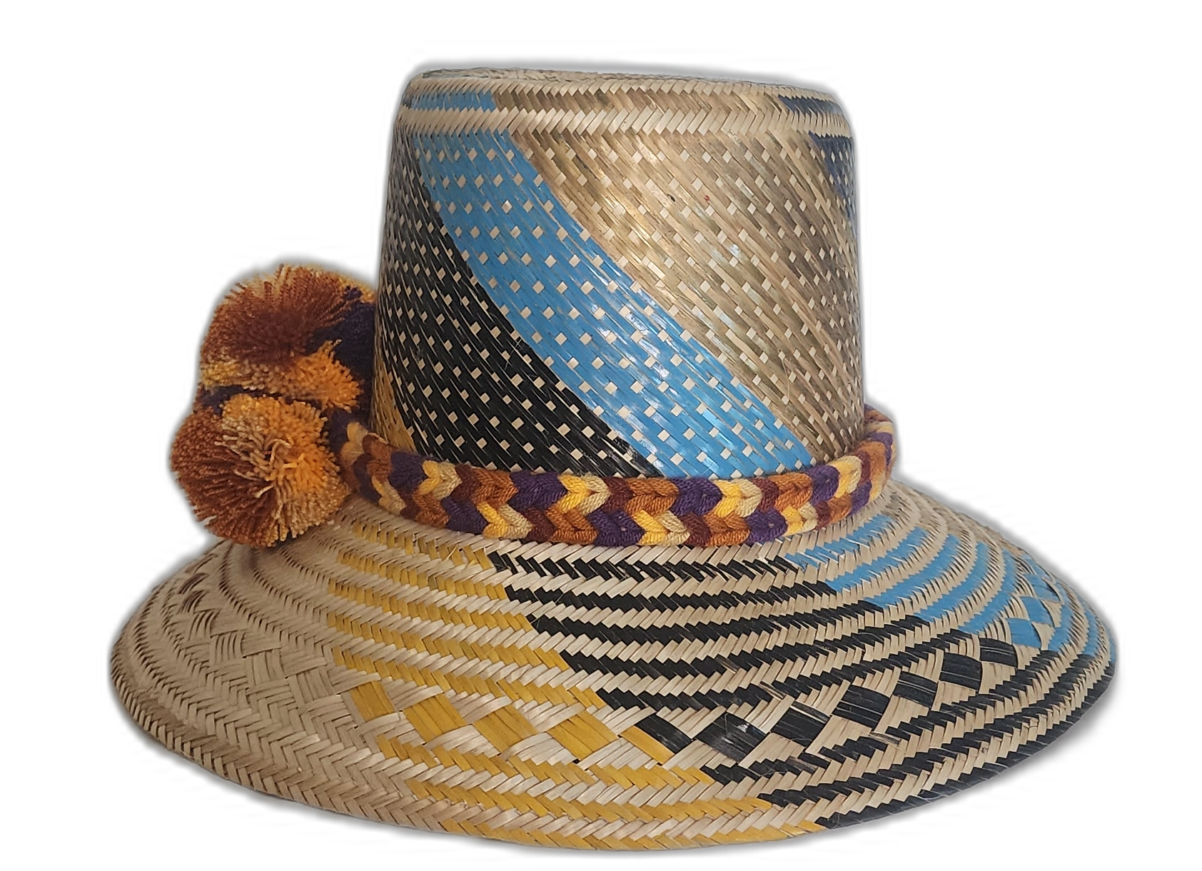 Boho chick straw hat crafted by Wayuu hands, showcasing intricate geometric weaving and bold color contrasts.