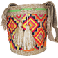 "Colorful handmade Wayuu crochet bag, adjustable strap, reflects vibrant Bohemian artistry and Wayuu heritage."