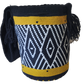 "Colorful handmade Wayuu crochet bag crafted by artisans, featuring vibrant patterns and a versatile boho design."