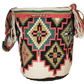 "Colorful handmade Wayuu crochet bag, featuring intricate patterns and a boho design, ideal for versatile use."