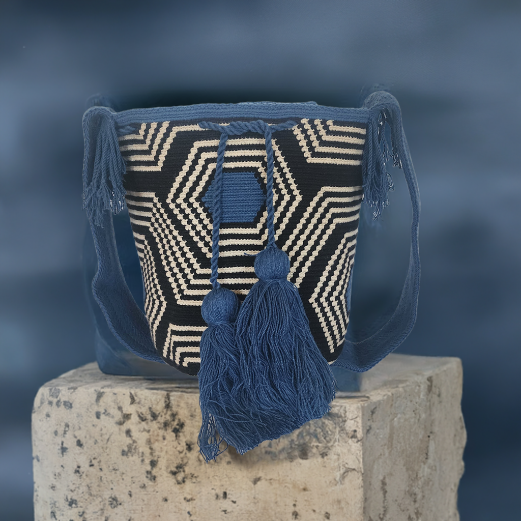 "Colorful handmade Wayuu crochet bag, showcasing exquisite craftsmanship and geometric patterns, perfect as a boho crossbody 