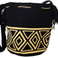 "Colorful handmade Wayuu crochet bag showcasing vibrant geometric patterns and adjustable straps, perfect for versatile use."