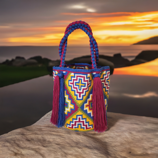 "Colorful handmade Wayuu crochet bag with a cascading waterfall design, crafted by skilled artisans, ideal for various occasi