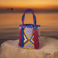 "Colorful handmade Wayuu crochet bag with a cascading waterfall design, crafted by skilled artisans, ideal for various occasi