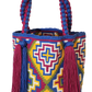 "Colorful handmade Wayuu crochet bag with a cascading waterfall design, crafted by skilled artisans, ideal for various occasi