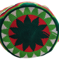 "Colorful handmade Wayuu crochet bag with adjustable strap for shoulder or crossbody wear, showcasing unique boho patterns."