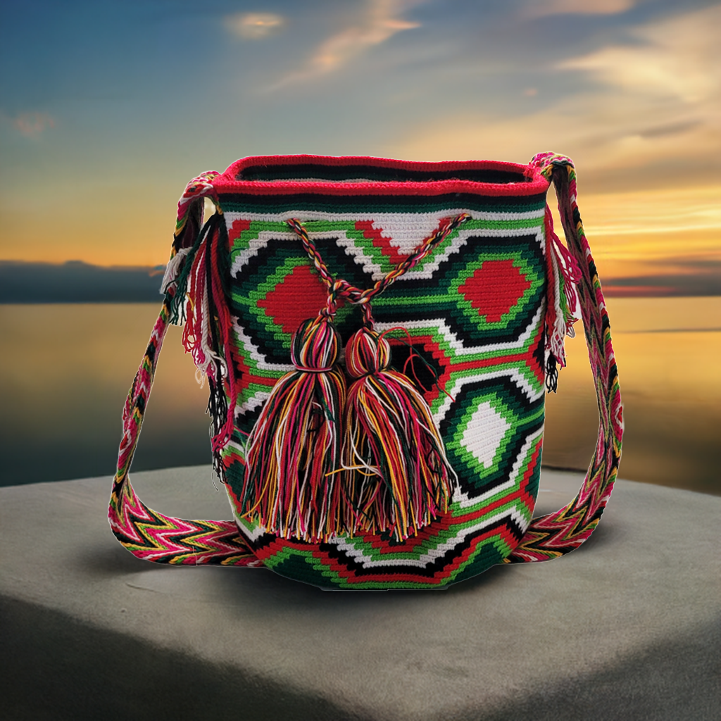 "Colorful handmade Wayuu crochet bag with adjustable strap for shoulder or crossbody wear, showcasing unique boho patterns."
