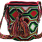 "Colorful handmade Wayuu crochet bag with adjustable strap for shoulder or crossbody wear, showcasing unique boho patterns."