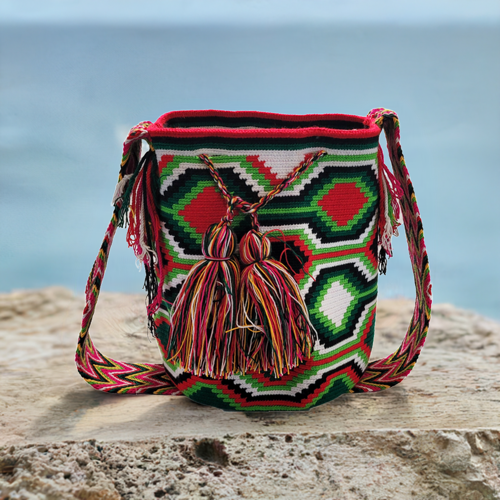 Bottom view "Colorful handmade Wayuu crochet bag with adjustable strap for shoulder or crossbody wear, showcasing unique boho patterns."