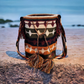 "Colorful handmade Wayuu crochet bag with geometric patterns, adjustable strap, perfect for daily use or beach outings."