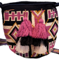 "Colorful handmade Wayuu crochet bag with geometric patterns and long, artisan-crafted straps for versatile wear."