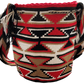 "Colorful handmade Wayuu crochet bag with intricate geometric patterns and adjustable strap, showcasing traditional Colombian