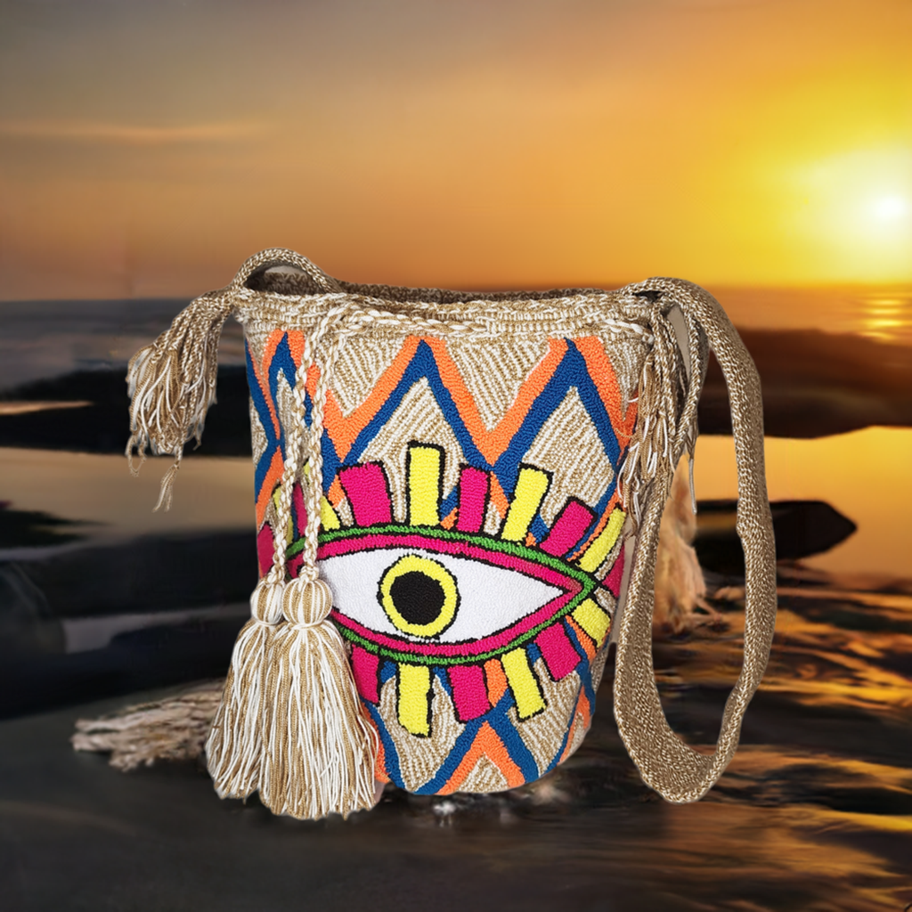 "Colorful handmade Wayuu crochet bag with intricate geometric patterns, showcasing traditional craftsmanship and modern boho 