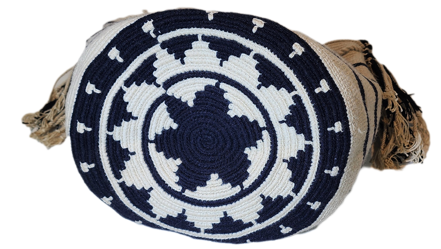 "Colorful handmade Wayuu crochet bag with intricate geometric patterns, showcasing traditional craftsmanship and ethical fash