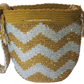 "Colorful handmade Wayuu crochet bag with intricate patterns and a long strap, showcasing traditional craftsmanship."