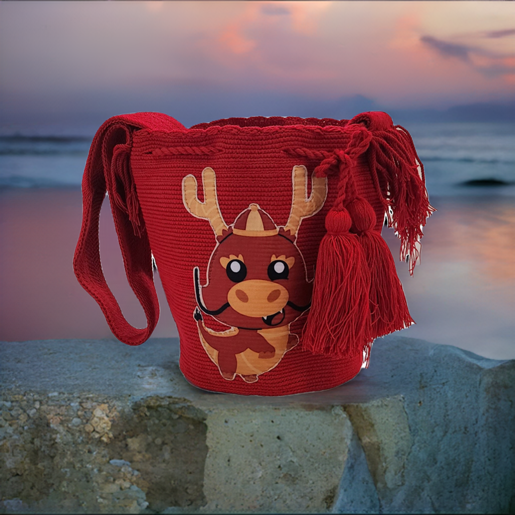 "Colorful handmade Wayuu crochet bag with vibrant bohemian designs, showcasing artisan craftsmanship and ethical fashion."