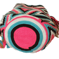 "Colorful handmade Wayuu crochet crossbody bag, showcasing traditional vibrant patterns and a boho flair, perfect for versati